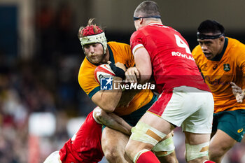 2024-11-17 - Fraser McReight of Australia under pressure from Will Rowlands of Wales during the 2024 Autumn Nations Series rugby union match between Wales and Australia on 17 November 2024 at Millenium Stadium in Cardiff, Wales - RUGBY - AUTUMN NATIONS SERIES 2024 - WALES V AUSTRALIA - AUTUMN NATIONS SERIES - RUGBY