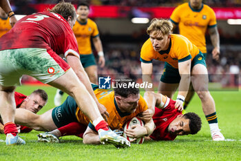 2024-11-17 - Matt Faessler of Australia scores his sides fifth try during the 2024 Autumn Nations Series rugby union match between Wales and Australia on 17 November 2024 at Millenium Stadium in Cardiff, Wales - RUGBY - AUTUMN NATIONS SERIES 2024 - WALES V AUSTRALIA - AUTUMN NATIONS SERIES - RUGBY