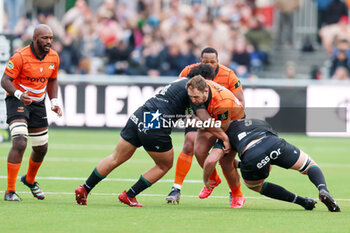 2024-01-14 - Marko Janse Van Rensburg of Toyota Cheetah's (RSA) and Paulo Pelesasa, Fabrice Metz of Section Paloise during the EPCR Challenge Cup rugby union match between Toyota Cheetahs and Section Paloise (Pau) on January 14, 2024 at NRCA Amsterdam in Amsterdam, Netherlands - RUGBY - CHALLENGE CUP - CHEETAHS V PAU - CHALLENGE CUP - RUGBY
