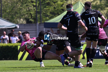 14/04/2024 - Tackle of Tommaso Menoncello ( Benetton Rugby ) during EPCR CHALLENGE CUP game between BENETTON RUGBY and CONNACHT at Monigo Stadium, Italy on April 14, 2024 - BENETTON RUGBY VS CONNACTH RUGBY - CHALLENGE CUP - RUGBY