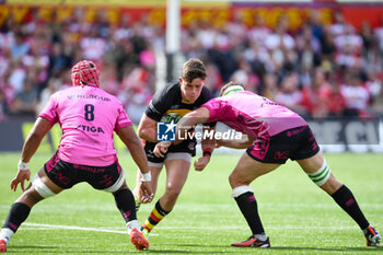 04/05/2024 - Gloucester Rugby Centre Seb Atkinson (12) is tackled by Benetton Treviso Back row Toa Halafihi (8) and Benetton Treviso Back row Seb Negri (6) during the European Rugby Challenge Cup, semi-final rugby union match between Gloucester Rugby and Benetton Rugby on 4 May 2024 at the Kingsholm Stadium in Gloucester, England - RUGBY - CHALLENGE CUP - GLOUCESTER V BENETTON RUGBY - CHALLENGE CUP - RUGBY