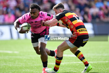 04/05/2024 - Gloucester Rugby Centre Seb Atkinson (12) tries to tackle Benetton Treviso Winger Onisi Ratave (11) during the European Rugby Challenge Cup, semi-final rugby union match between Gloucester Rugby and Benetton Rugby on 4 May 2024 at the Kingsholm Stadium in Gloucester, England - RUGBY - CHALLENGE CUP - GLOUCESTER V BENETTON RUGBY - CHALLENGE CUP - RUGBY