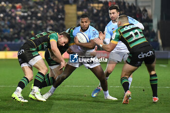 2024-01-12 - Bayonne wing Nadir Megdoud (14) tackles by Northampton Saints centre Rory Hutchinson (12) during the Champions Cup, rugby union match between Northampton Saints and Aviron Bayonnais (Bayonne) on 12 January 2024 at Franklins Gardens in Northampton, England - RUGBY - CHAMPIONS CUP - NORTHAMPTON V BAYONNE - CHAMPIONS CUP - RUGBY