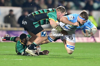 2024-01-12 - Northampton Saints prop Alex Waller (1) Tackles Bayonne back row Baptiste Heguy (7) during the Champions Cup, rugby union match between Northampton Saints and Aviron Bayonnais (Bayonne) on 12 January 2024 at Franklins Gardens in Northampton, England - RUGBY - CHAMPIONS CUP - NORTHAMPTON V BAYONNE - CHAMPIONS CUP - RUGBY