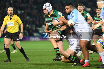 2024-01-12 - Northampton Saints hooker Curtis Langdon (2) tackled by Bayonne prop Tevita Tatafu (3) during the Champions Cup, rugby union match between Northampton Saints and Aviron Bayonnais (Bayonne) on 12 January 2024 at Franklins Gardens in Northampton, England - RUGBY - CHAMPIONS CUP - NORTHAMPTON V BAYONNE - CHAMPIONS CUP - RUGBY
