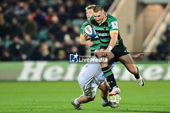 2024-01-12 - Northampton Saints wing Ollie Sleightholme (11) breaks through a tackle during the Champions Cup, rugby union match between Northampton Saints and Aviron Bayonnais (Bayonne) on 12 January 2024 at Franklins Gardens in Northampton, England - RUGBY - CHAMPIONS CUP - NORTHAMPTON V BAYONNE - CHAMPIONS CUP - RUGBY