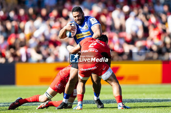2024-04-14 - Scott Sio of Exeter Chiefs is tackled by Peato Mauvaka of Toulouse during the European Rugby Champions Cup, quarter final, rugby union match between Stade Toulousain (Toulouse) and Exeter Chiefs on 14 April 2024 at Stade Ernest-Wallon in Toulouse, France - RUGBY - CHAMPIONS CUP - TOULOUSE V EXETER - CHAMPIONS CUP - RUGBY