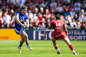 2024-04-14 - Ollie Devoto of Exeter Chiefs and Juan Cruz Mallia of Toulouse during the European Rugby Champions Cup, quarter final, rugby union match between Stade Toulousain (Toulouse) and Exeter Chiefs on 14 April 2024 at Stade Ernest-Wallon in Toulouse, France - RUGBY - CHAMPIONS CUP - TOULOUSE V EXETER - CHAMPIONS CUP - RUGBY
