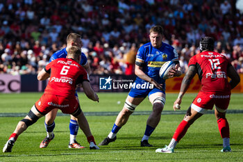 2024-04-14 - Lewis Pearson of Exeter Chiefs and Jack Willis, Pita Ahki of Toulouse during the European Rugby Champions Cup, quarter final, rugby union match between Stade Toulousain (Toulouse) and Exeter Chiefs on 14 April 2024 at Stade Ernest-Wallon in Toulouse, France - RUGBY - CHAMPIONS CUP - TOULOUSE V EXETER - CHAMPIONS CUP - RUGBY
