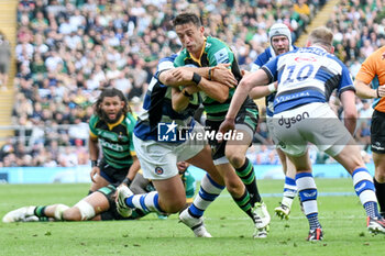 2024-06-08 - Northampton Saints scrum half Alex Mitchell (9) tackled during the English championship, Gallagher Premiership Rugby Union Final match between Northampton Saints and Bath Rugby on 8 June 2024 at Twickenham stadium in Richmond, London, England - RUGBY - ENGLISH CHAMPIONSHIP - FINAL - NORTHAMPTON V BATH - PREMERSHIP RUGBY UNION - RUGBY