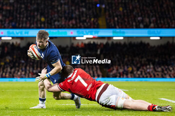 2024-02-03 - Ben White of Scotland is tackled by Tommy Reffell of Wales during the 2024 Six nations Championship, rugby union match between Wales and Scotland on 3 February 2024 at Millenium Stadium in Cardiff, Wales - RUGBY - SIX NATIONS 2024 - WALES V SCOTLAND - SIX NATIONS - RUGBY