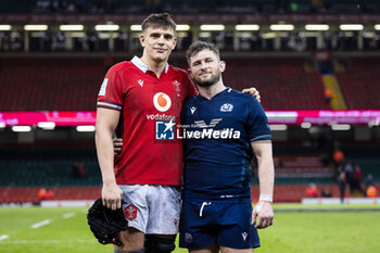 2024-02-03 - Dafydd Jenkins of Wales and Alec Hepburn of Scotland Exeter Chiefs team mates pose for a photo after the 2024 Six nations Championship, rugby union match between Wales and Scotland on 3 February 2024 at Millenium Stadium in Cardiff, Wales - RUGBY - SIX NATIONS 2024 - WALES V SCOTLAND - SIX NATIONS - RUGBY