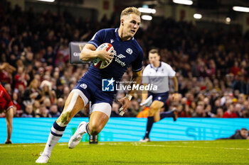 2024-02-03 - Duhan van der Merwe of Scotland scores his sides third try during the 2024 Six nations Championship, rugby union match between Wales and Scotland on 3 February 2024 at Millenium Stadium in Cardiff, Wales - RUGBY - SIX NATIONS 2024 - WALES V SCOTLAND - SIX NATIONS - RUGBY