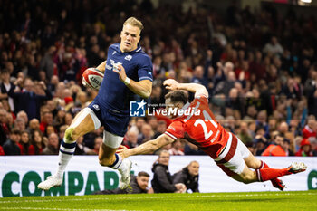 2024-02-03 - Duhan van der Merwe of Scotland evades the tackle of Tomos Williams of Wales on the way to scoring during the 2024 Six nations Championship, rugby union match between Wales and Scotland on 3 February 2024 at Millenium Stadium in Cardiff, Wales - RUGBY - SIX NATIONS 2024 - WALES V SCOTLAND - SIX NATIONS - RUGBY