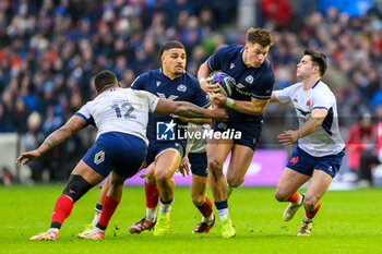 2024-02-10 - Huw Jones of Scotland and Jonathan Danty, Nolann Le Garrec of France during the 2024 Six nations Championship, rugby union match between Scotland and France on 10 February 2024 at Scottish Gas Murrayfield in Edinburgh, Scotland - RUGBY - SIX NATIONS 2024 - SCOTLAND V FRANCE - SIX NATIONS - RUGBY