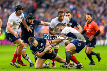 2024-02-10 - Cyril Baille of France tries to strip the ball from George Turner of Scotland during the 2024 Six nations Championship, rugby union match between Scotland and France on 10 February 2024 at Scottish Gas Murrayfield in Edinburgh, Scotland - RUGBY - SIX NATIONS 2024 - SCOTLAND V FRANCE - SIX NATIONS - RUGBY