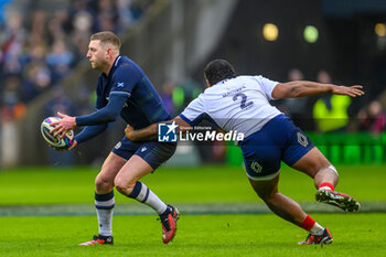 2024-02-10 - Peato Mauvaka of France tackles Finn Russell of Scotland during the 2024 Six nations Championship, rugby union match between Scotland and France on 10 February 2024 at Scottish Gas Murrayfield in Edinburgh, Scotland - RUGBY - SIX NATIONS 2024 - SCOTLAND V FRANCE - SIX NATIONS - RUGBY