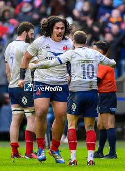 2024-02-10 - Posolo Tuilagi celebrates with Matthieu Jalibert of France at full time during the 2024 Six nations Championship, rugby union match between Scotland and France on 10 February 2024 at Scottish Gas Murrayfield in Edinburgh, Scotland - RUGBY - SIX NATIONS 2024 - SCOTLAND V FRANCE - SIX NATIONS - RUGBY