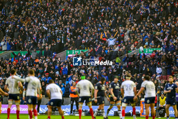 2024-02-10 - The French fans celebrate during the 2024 Six nations Championship, rugby union match between Scotland and France on 10 February 2024 at Scottish Gas Murrayfield in Edinburgh, Scotland - RUGBY - SIX NATIONS 2024 - SCOTLAND V FRANCE - SIX NATIONS - RUGBY
