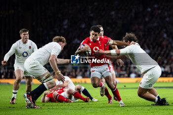 2024-02-10 - Rio Dyer of Wales under pressure from Will Stuart of England during the 2024 Six nations Championship, rugby union match between England and Wales on 10 February 2024 at Twickenham stadium in London, England - RUGBY - SIX NATIONS 2024 - ENGLAND V WALES - SIX NATIONS - RUGBY