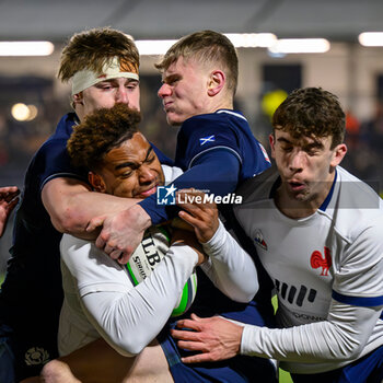 2024-02-09 - Simeli Daunivucu of France and Freddy Douglas, Fergus Watson of Scotland during the 2024 Under 20 Six Nations championship, rugby union match between Scotland and France on 9 February 2024 at the Hive Stadium in Edinburgh, Scotland - RUGBY - U20 SIX NATIONS 2024 - SCOTLAND V FRANCE - SIX NATIONS - RUGBY