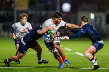 2024-02-09 - Mathis Castro-Ferreira of France tries to break through tackles during the 2024 Under 20 Six Nations championship, rugby union match between Scotland and France on 9 February 2024 at the Hive Stadium in Edinburgh, Scotland - RUGBY - U20 SIX NATIONS 2024 - SCOTLAND V FRANCE - SIX NATIONS - RUGBY