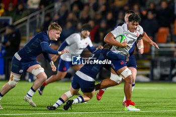 2024-02-09 - Murdoch Lock of Scotland tackles Patrick Tuifua of France during the 2024 Under 20 Six Nations championship, rugby union match between Scotland and France on 9 February 2024 at the Hive Stadium in Edinburgh, Scotland - RUGBY - U20 SIX NATIONS 2024 - SCOTLAND V FRANCE - SIX NATIONS - RUGBY