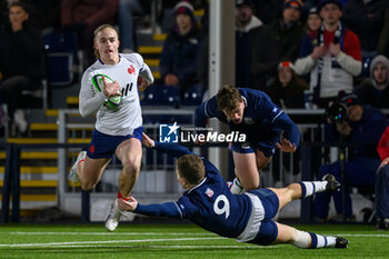 2024-02-09 - Hoani Bosmorin of France avoids the tackle of Murdoch Lock of Scotland during the 2024 Under 20 Six Nations championship, rugby union match between Scotland and France on 9 February 2024 at the Hive Stadium in Edinburgh, Scotland - RUGBY - U20 SIX NATIONS 2024 - SCOTLAND V FRANCE - SIX NATIONS - RUGBY