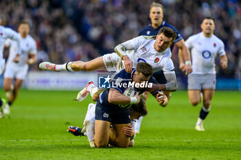 2024-02-24 - Huw Jones of Scotland is tackled by George Furbank and Tommy Freeman of England during the 2024 Six nations Championship, rugby union match between Scotland and England on 24 February 2024 at Scottish Gas Murrayfield in Edinburgh, Scotland - RUGBY - SIX NATIONS 2024 - SCOTLAND V ENGLAND - SIX NATIONS - RUGBY