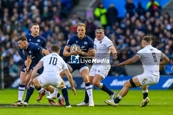 2024-02-24 - Duhan van der Merwe of Scotland runs at George Ford of England during the 2024 Six nations Championship, rugby union match between Scotland and England on 24 February 2024 at Scottish Gas Murrayfield in Edinburgh, Scotland - RUGBY - SIX NATIONS 2024 - SCOTLAND V ENGLAND - SIX NATIONS - RUGBY
