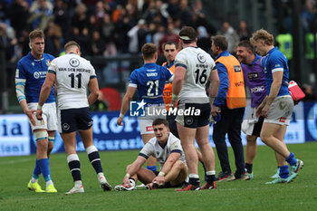 2024-03-09 - Rome, Italy 09.03.2024: Disappointment from the Scotland players while Italy celebrates the victory at the end of the Guinness Six Nations 2024 tournament match between Italy and Scotland at Stadio Olimpico on March 09, 2024 in Rome, Italy.
 - ITALY VS SCOTLAND - SIX NATIONS - RUGBY