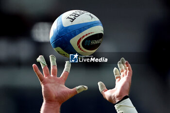 2024-03-09 - Rome, Italy 09.03.2024: hands grab oval ball during warm up before the Guinness Six Nations 2024 tournament match between Italy and Scotland at Stadio Olimpico on March 09, 2024 in Rome, Italy.
 - ITALY VS SCOTLAND - SIX NATIONS - RUGBY