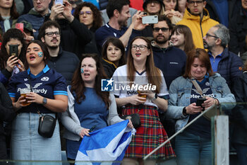 2024-03-09 - Rome, Italy 09.03.2024: Scotland girl fans sing the Scottish anthem first the Guinness Six Nations 2024 tournament match between Italy and Scotland at Stadio Olimpico on March 09, 2024 in Rome, Italy.
 - ITALY VS SCOTLAND - SIX NATIONS - RUGBY