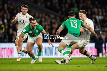 2024-03-09 - Tommy Freeman of England under pressure from Robbie Henshaw of Ireland during the 2024 Six Nations Championship, rugby union match between England and Ireland on 9 March 2024 at Twickenham stadium in London, England - RUGBY - SIX NATIONS 2024 - ENGLAND V IRELAND - SIX NATIONS - RUGBY