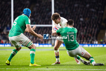 2024-03-09 - George Furbank of England is tackled by Robbie Henshaw of Ireland during the 2024 Six Nations Championship, rugby union match between England and Ireland on 9 March 2024 at Twickenham stadium in London, England - RUGBY - SIX NATIONS 2024 - ENGLAND V IRELAND - SIX NATIONS - RUGBY