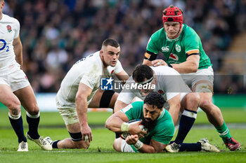 2024-03-09 - Bundee Aki of Ireland under pressure from Jamie George of England during the 2024 Six Nations Championship, rugby union match between England and Ireland on 9 March 2024 at Twickenham stadium in London, England - RUGBY - SIX NATIONS 2024 - ENGLAND V IRELAND - SIX NATIONS - RUGBY