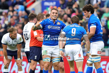 2024-03-09 - Lorenzo Cannone of Italy celebrates the victory with Martin Page-Relo at the end of the 2024 Six nations Championship, rugby union match between Italy and Scotland on March 9, 2024 at Stadio Olimpico in Rome, Italy - RUGBY - SIX NATIONS 2024 - ITALY V SCOTLAND - SIX NATIONS - RUGBY