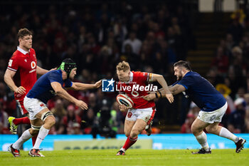10/03/2024 - Sam Costelow of Wales under pressure from François Cros, Cyril Baille of France during the 2024 Six nations Championship, rugby union match between Wales and France on 10 March 2024 at Millenium Stadium in Cardiff, Wales - RUGBY - SIX NATIONS 2024 - WALES V FRANCE - 6 NAZIONI - RUGBY