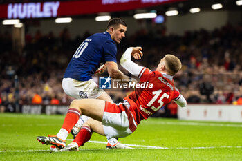 2024-03-10 - Thomas Ramos of France and Cameron Winnett of Wales during the 2024 Six nations Championship, rugby union match between Wales and France on 10 March 2024 at Millenium Stadium in Cardiff, Wales - RUGBY - SIX NATIONS 2024 - WALES V FRANCE - SIX NATIONS - RUGBY