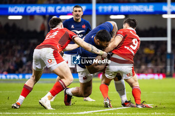 2024-03-10 - Romain Taofifenua of France and Joe Roberts, Tomos Williams of Wales during the 2024 Six nations Championship, rugby union match between Wales and France on 10 March 2024 at Millenium Stadium in Cardiff, Wales - RUGBY - SIX NATIONS 2024 - WALES V FRANCE - SIX NATIONS - RUGBY