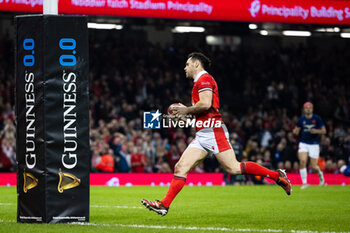 2024-03-10 - Tomos Williams of Wales scores his sides second try during the 2024 Six nations Championship, rugby union match between Wales and France on 10 March 2024 at Millenium Stadium in Cardiff, Wales - RUGBY - SIX NATIONS 2024 - WALES V FRANCE - SIX NATIONS - RUGBY
