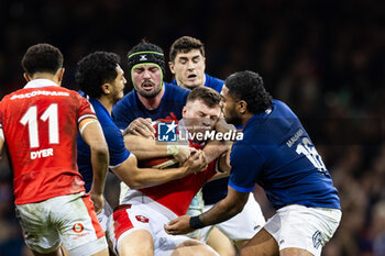 10/03/2024 - Mason Grady of Wales under pressure from Yoram Moefana, Gregory Alldritt, Peato Mauvaka of France during the 2024 Six nations Championship, rugby union match between Wales and France on 10 March 2024 at Millenium Stadium in Cardiff, Wales - RUGBY - SIX NATIONS 2024 - WALES V FRANCE - 6 NAZIONI - RUGBY