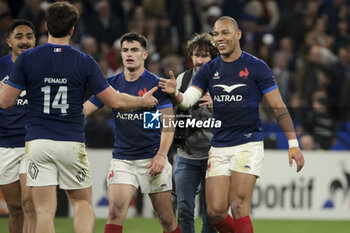 2024-03-16 - Gael Fickou of France celebrates his try with Nolan Le Garrec (left) during the 2024 Six nations Championship, rugby union match between France and England on March 16, 2024 at Groupama stadium in Décines-Charpieu near Lyon, France - RUGBY - SIX NATIONS 2024 - FRANCE V ENGLAND - SIX NATIONS - RUGBY