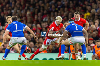 2024-03-16 - Aaron Wainwright of Wales drives at Giacomo Nicotera of Italy during the 2024 Six nations Championship, rugby union match between Wales and Italy on 16 March 2024 at Millenium Stadium in Cardiff, Wales - RUGBY - SIX NATIONS 2024 - WALES V ITALY - SIX NATIONS - RUGBY