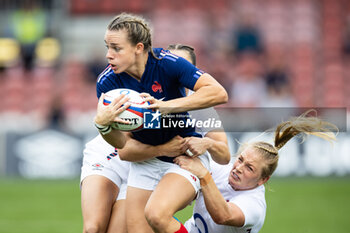 2024-09-07 - Marine Menager of France is tackled by Alex Matthews of England during the Rugby International match between England Women and France Women at the Kingsholm Stadium, Gloucester, United Kingdom on 7 September 2024. Photo Simon King /ProSportsImages / DPPI - RUGBY - TEST MATCH - ENGLAND V FRANCE WOMEN - TEST MATCH - RUGBY