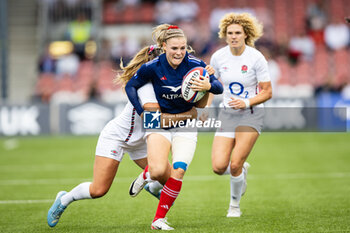 2024-09-07 - Chloe Jacquet of France is tackled by Jess Breach of England during the Rugby International match between England Women and France Women at the Kingsholm Stadium, Gloucester, United Kingdom on 7 September 2024. Photo Simon King /ProSportsImages / DPPI - RUGBY - TEST MATCH - ENGLAND V FRANCE WOMEN - TEST MATCH - RUGBY