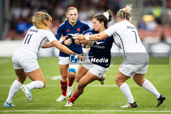 2024-09-07 - Cyrielle Banet of France is tackled by Marlie Packer of England during the Rugby International match between England Women and France Women at the Kingsholm Stadium, Gloucester, United Kingdom on 7 September 2024. Photo Simon King /ProSportsImages / DPPI - RUGBY - TEST MATCH - ENGLAND V FRANCE WOMEN - TEST MATCH - RUGBY