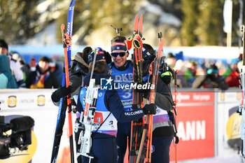 2024-01-20 - Tommaso Giacomel (ITA) celebrated by his team mate Lisa Vitozzi (ITA) Dorothea Wierer (ITA) and Didier Bionaz (ITA) after the second place - IBU BIATHLON WORLD CUP 2024 - MIXED RELAY (W+M) - BIATHLON - WINTER SPORTS