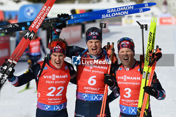 2024-01-21 - Vetle Sjaastad Christiansen (NOR) celebrating with his teammate DALE-SKJEVDAL Johannes (NOR) and Soerum VebJoern (NOR) the all Norwegian podium - IBU BIATHLON WORLD CUP 2024 - MEN'S 15KM MASS START - BIATHLON - WINTER SPORTS
