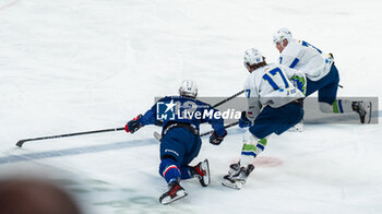 2024-04-24 - Baptiste BRUCHE of France and Rozle BOHINC of Slovenia during the International Friendly Ice Hockey match between France and Slovenia on April 24, 2024 at Aren’Ice in Cergy-Pontoise, France - ICE HOCKEY - FRIENDLY GAME - FRANCE V SLOVENIA - ICE HOCKEY - WINTER SPORTS
